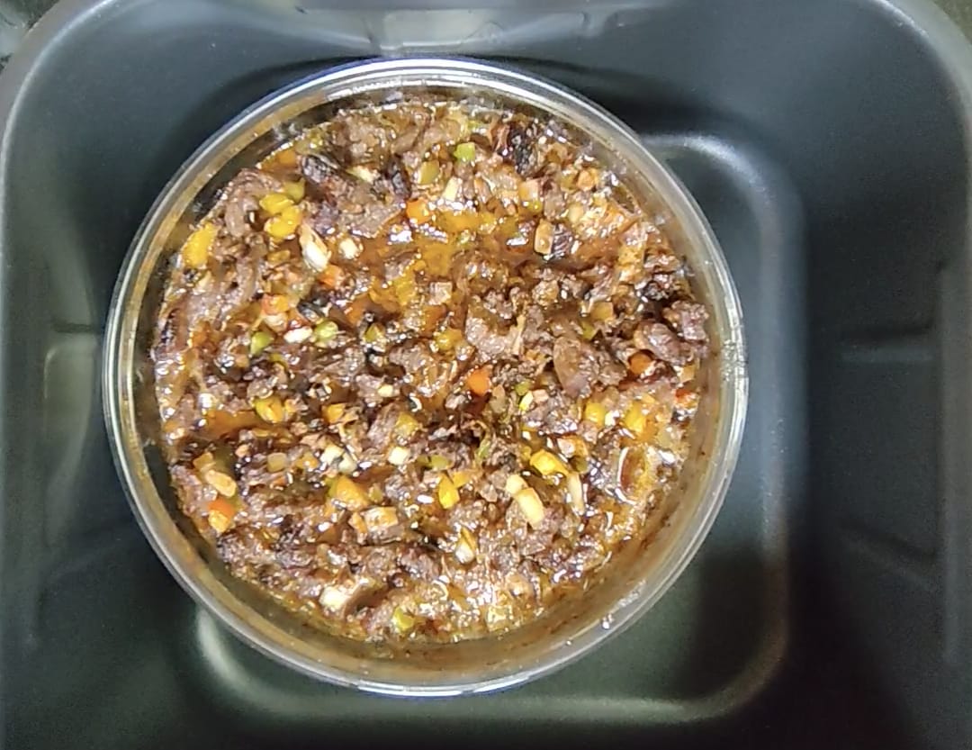 Cooked air fryer beef and vegetables with natural cooking juices